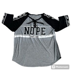 Black, white & gray T shirt jersey "Nope Don't Care" spell out lacing at neck L.